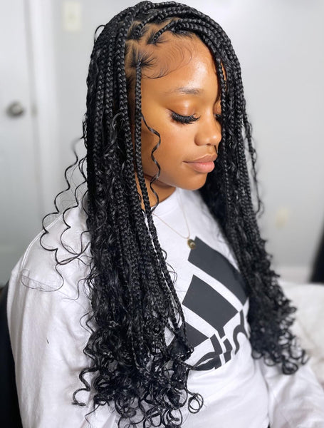 Boho braids with deep wave curls