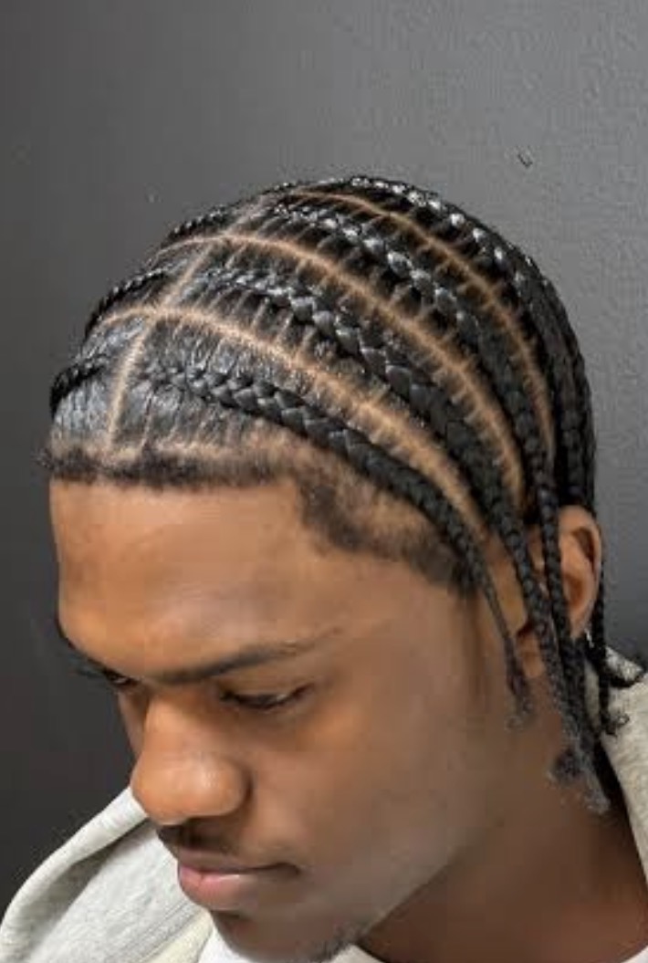 Men's cornrows with a clean pattern
